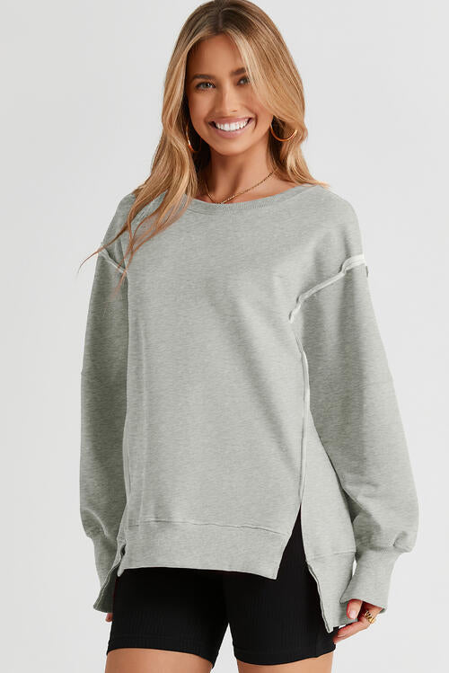 Exposed Seam Long Sleeve Slit Sweatshirt