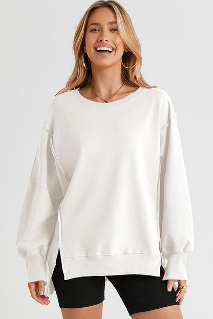 Exposed Seam Long Sleeve Slit Sweatshirt